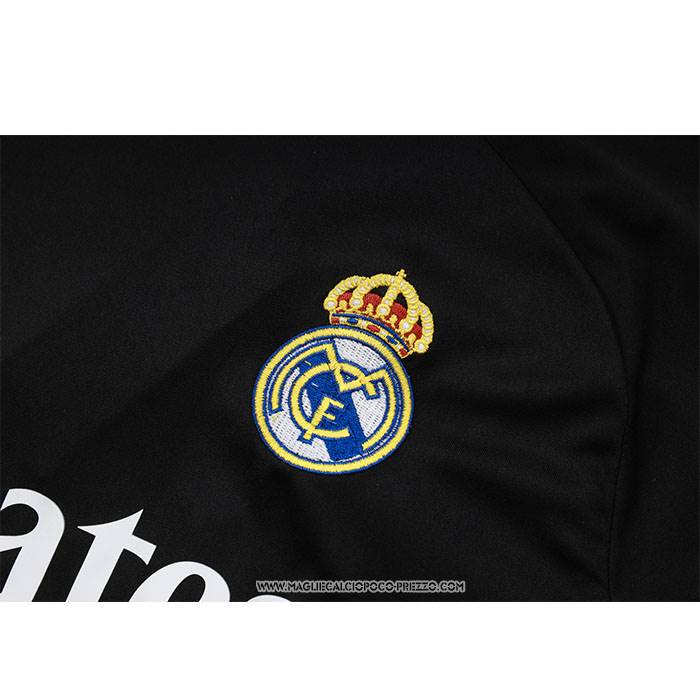 Tuta da Track
 Real Madrid Manica Corta
 Nero
 e 
Purpura - Pantaloncini
 Dragon 24-25